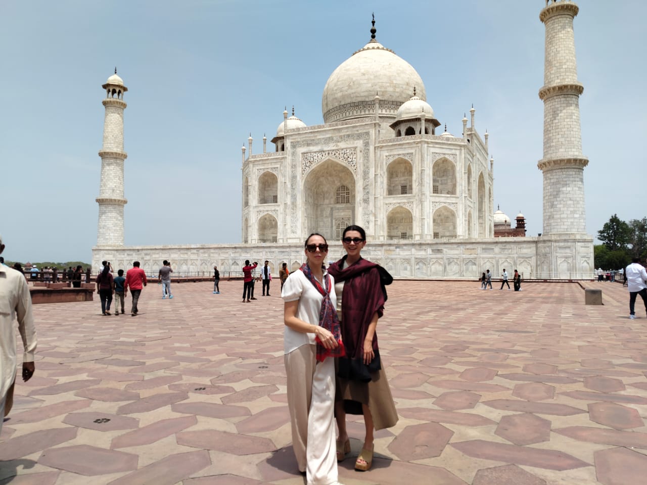 Mr. Verma with tourists smiling